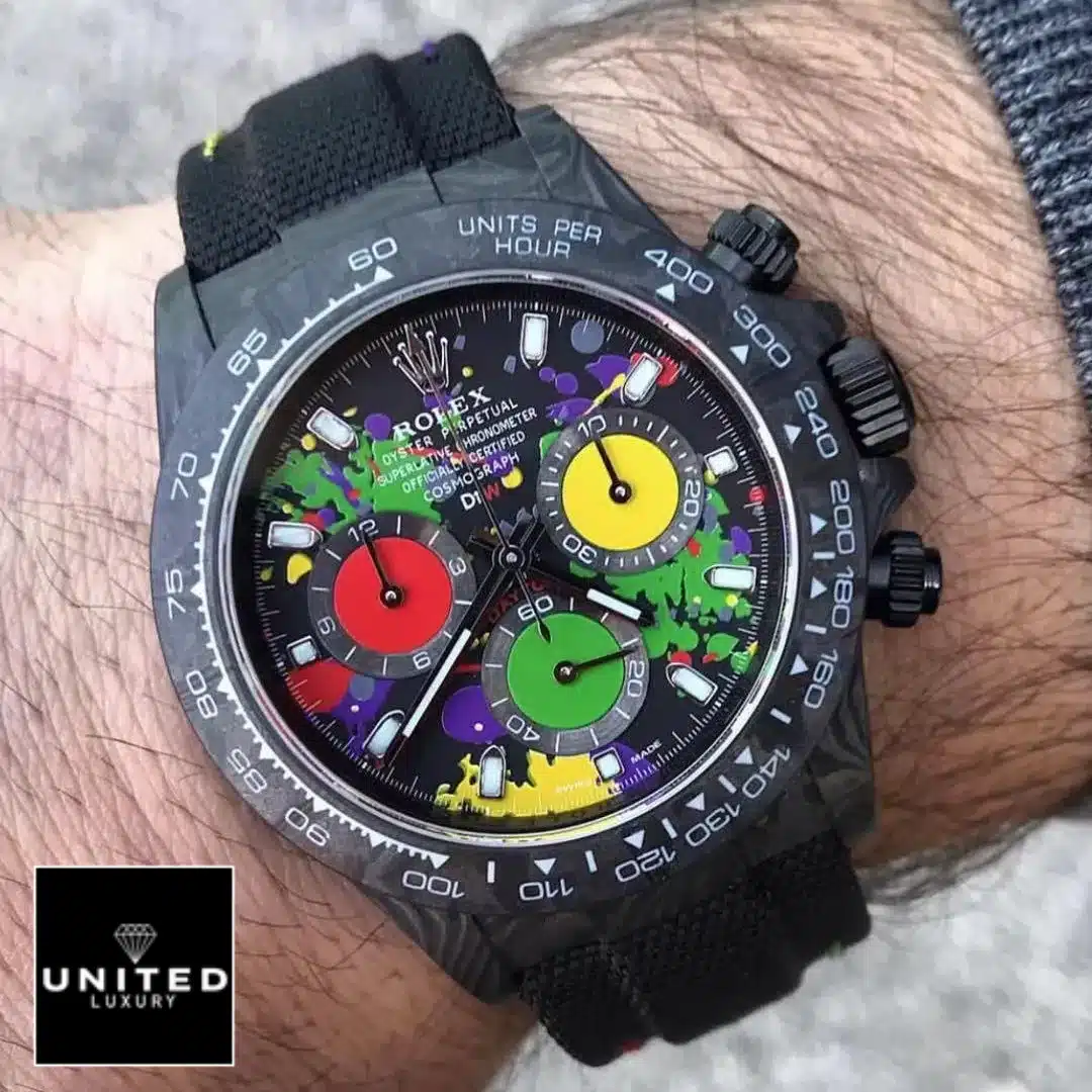 Rolex Daytona Carbon Rainbow Dial Black Button & Crown Pusher 4130cr  on his arm