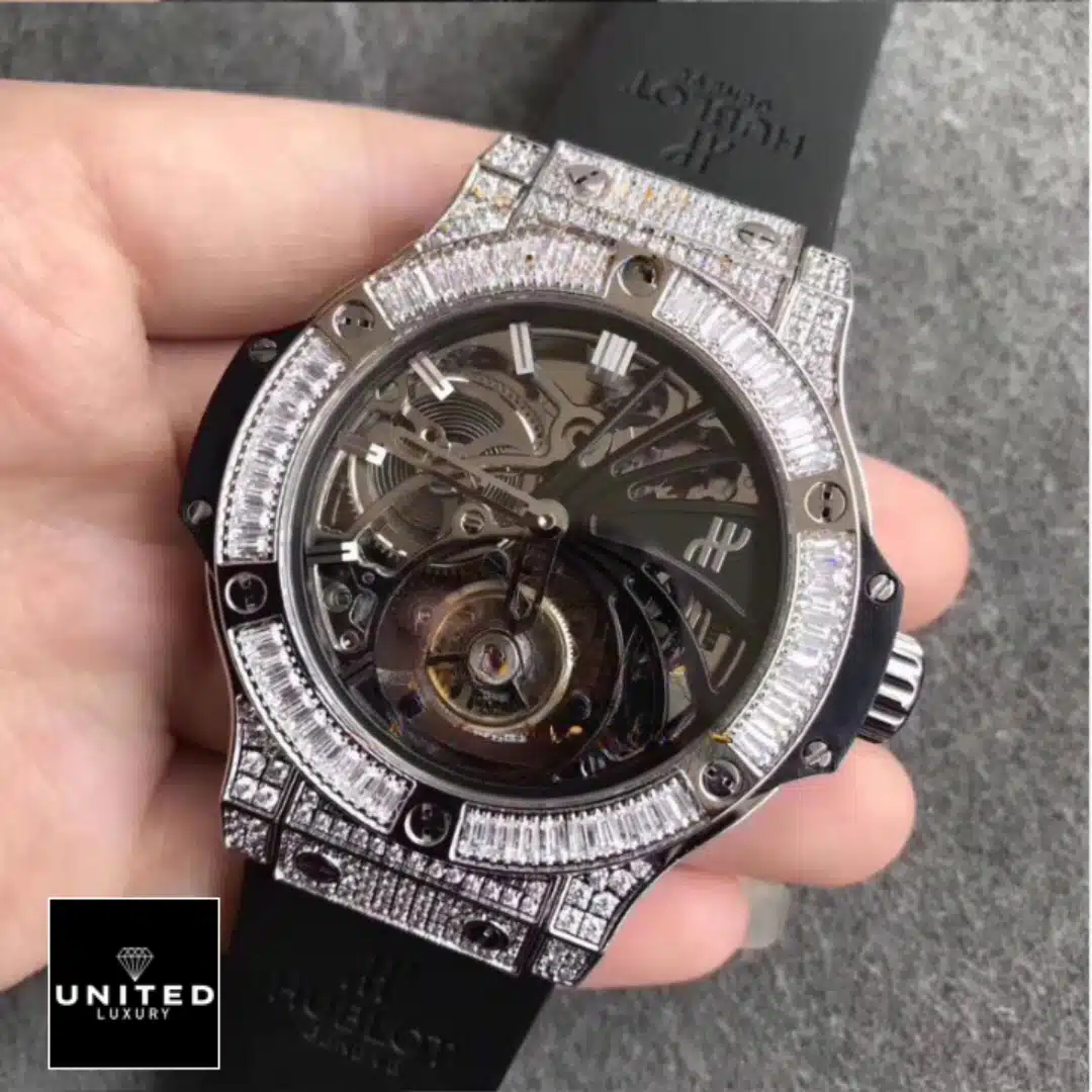 Hublot Skeleton Diamond Watch  on the hand view grey background