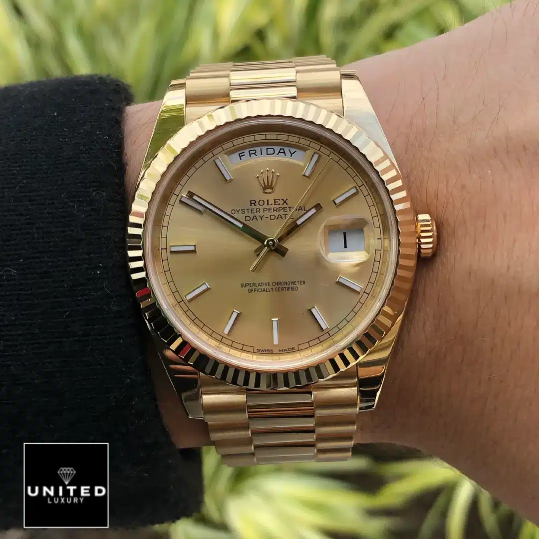 Rolex Day-Date 40 228238-0003 Champagne Dial Stick Indices  on his arm