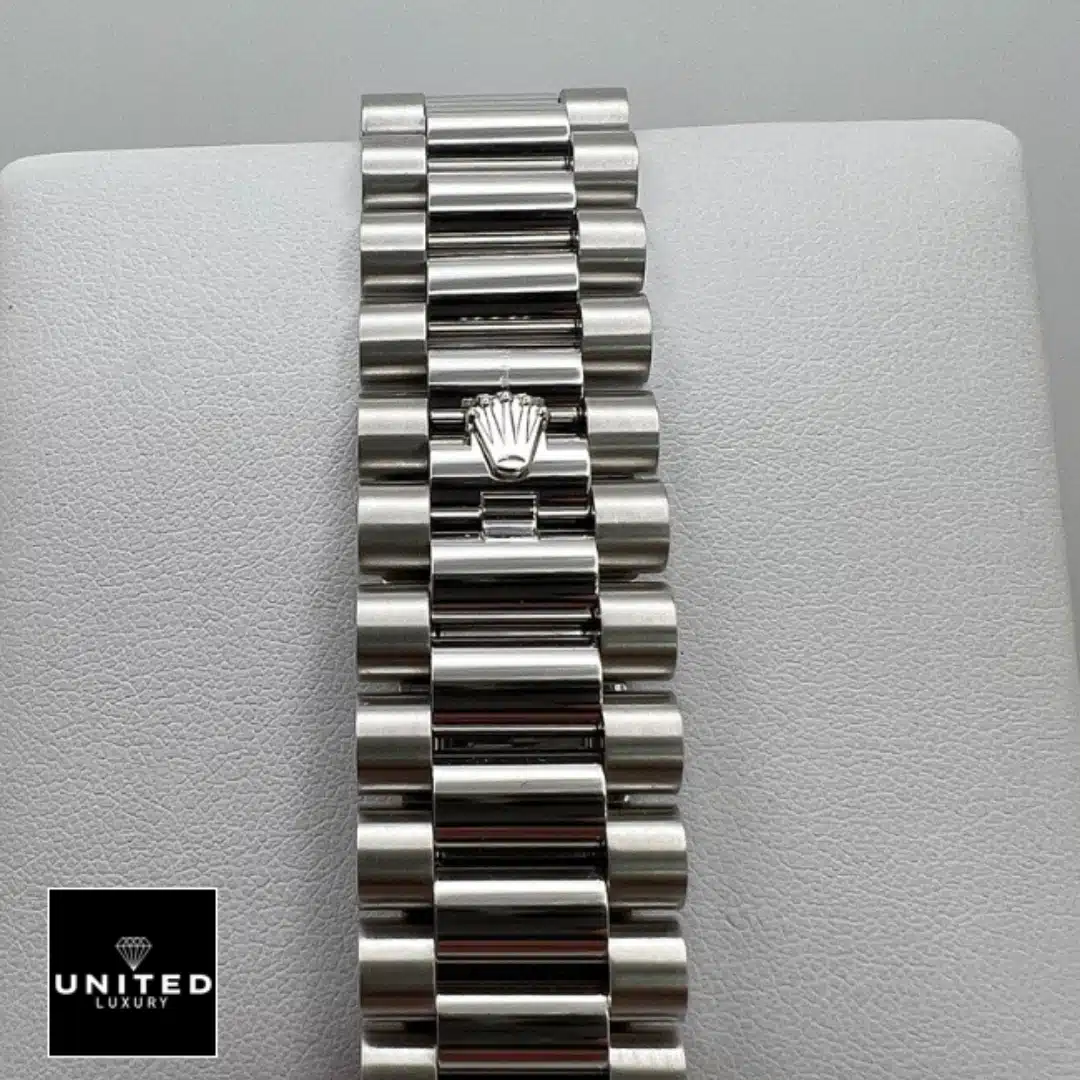 Rolex Day Date Olive Diamond 4 Rolex Day Date 228349RBR Stainless Steel Oyster Bracelet on the Rolex logo