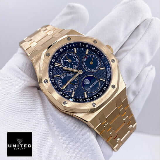Audemars Piguet Gold Blue Dial  on the white glove hand