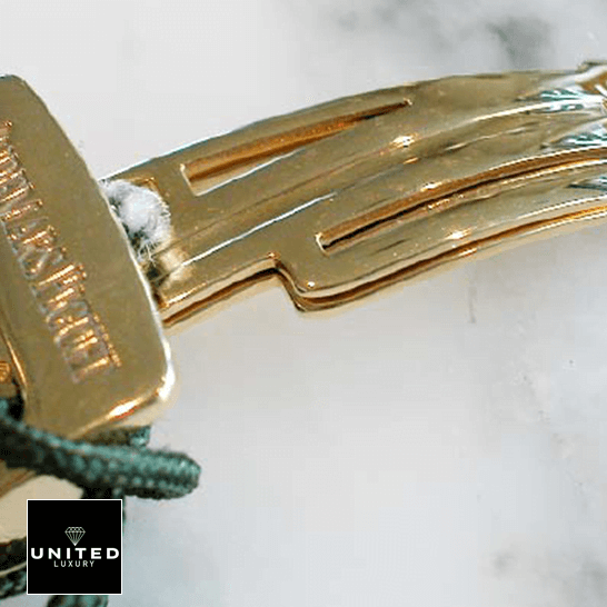 Audemars Piguet Royal Oak Yellow Gold Clasp  ceramic background