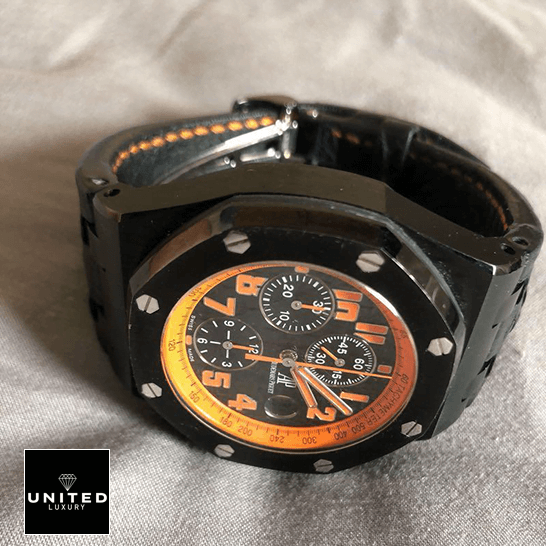 Audemars Piguet Royal Oak Orange Black Dial  on the white carpet
