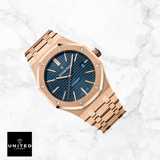 Audemars Piguet Royal Oak Pink Gold Blue Dial  white ceramic background