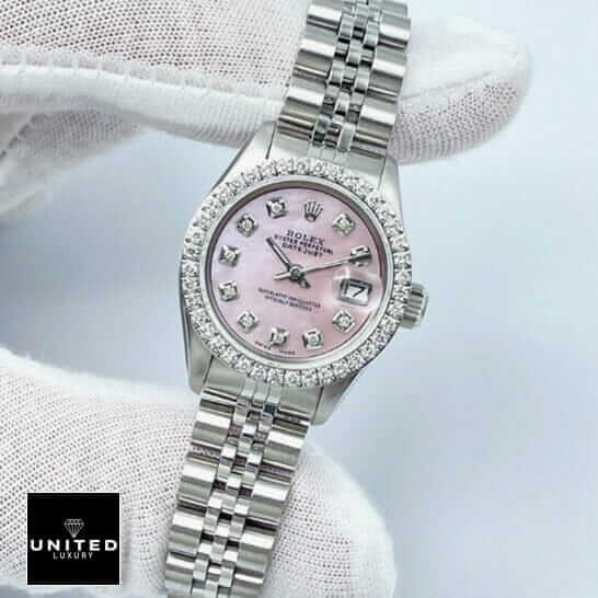 Rolex Datejust Diamond Bezel & Dial  between the fingers