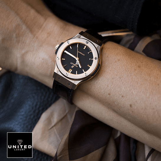 Hublot Classic Fusion Gold Bezel Black Dial  on the man wrist