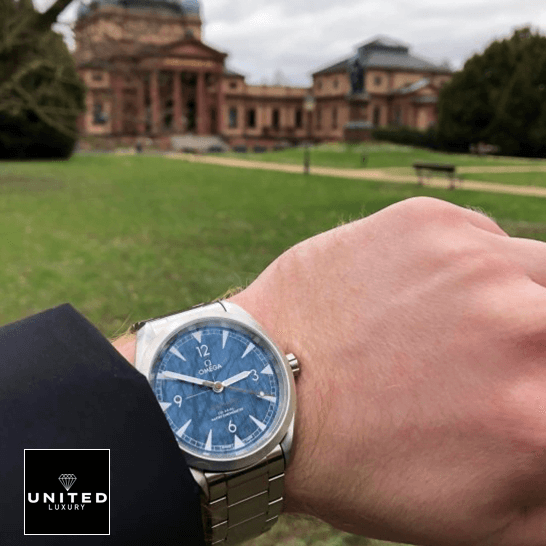 Omega 220.10.40.20.03.001 Seamaster Blue Dial  mansion background