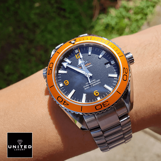 Omega Seamaster Planet Grey Dial Orange Bezel  on the wrist