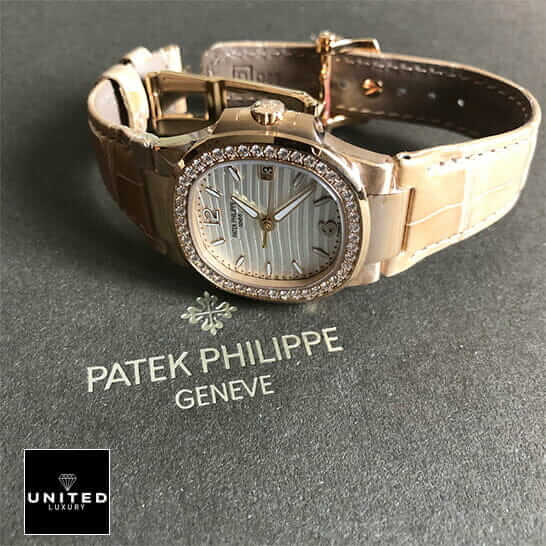 Patek Philippe 7010 Diamond Bezel Leather Bracelet  on the grey carpet