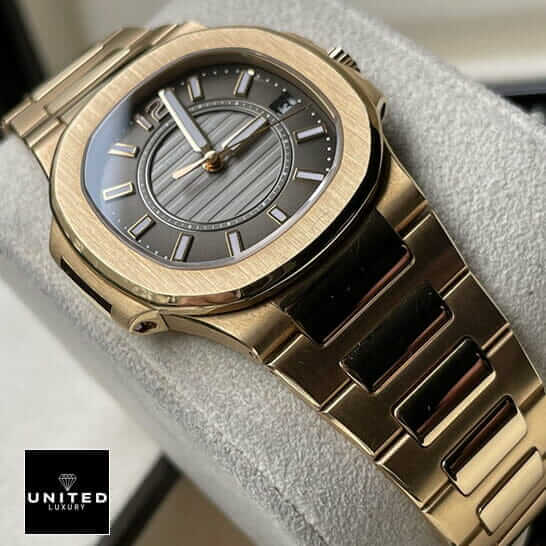 Patek Philippe 7011-1R-010 Gold Bracelet  on the stand