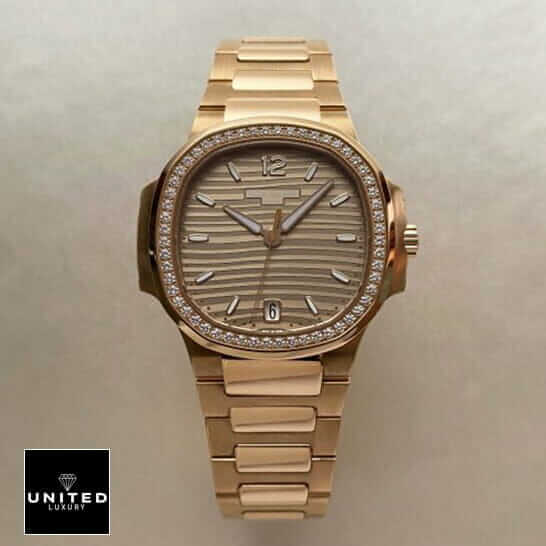 Patel Philippe Geneve Gold Diamond Bezel  front view rose gold background