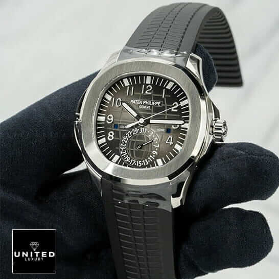 Patek Philippe Black Dial Steel Bezel  on the black glove hand