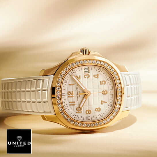 Patek Philippe Aquanaut Diamond Bezel White Dial  rose gold background