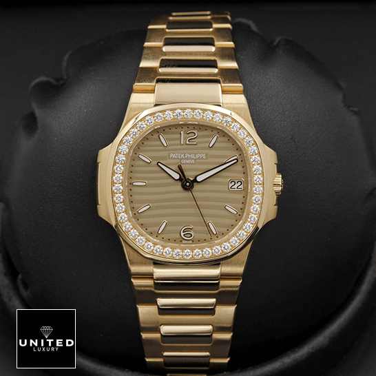 Patek Philippe Nautilus 70101R-012 Diamond Bezel Gold Bracelet  black background