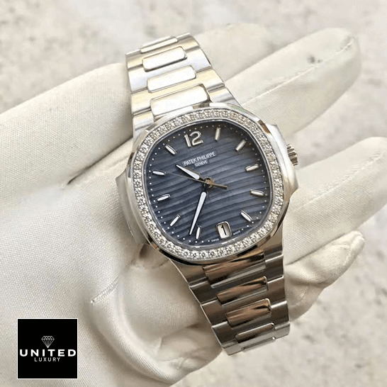 Patek Philippe Diamond Bezel Blue Dial Steel Bracelet  on the white glove hand