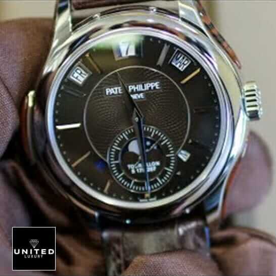 Patek Philippe Geneve Black Dial Steel Case  on the hand