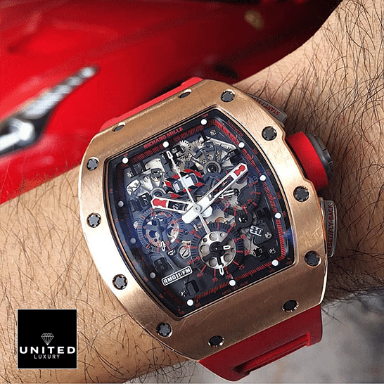 Richard Mille RM011 Red Demon Black Dial Gold Bezel  on the man wrist