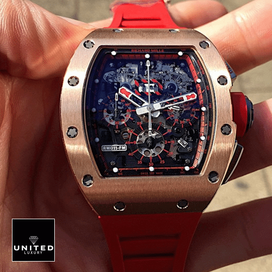 Richard Mille RM011 Red Bracelet Gold Bezel Black Dial  on the hand