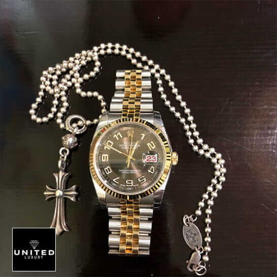 Rolex Datejust Steel Yellow Gold 116233  next to the necklace