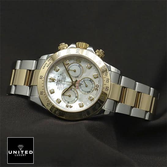 Rolex Daytona Two Tone White Dial 116523  on the black table