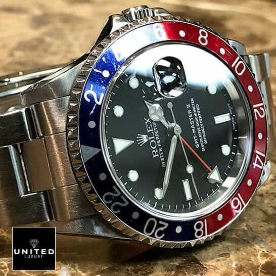 Rolex Submariner GMT-Master II Red & Blue Bezel 16710 Oyster  on the Table