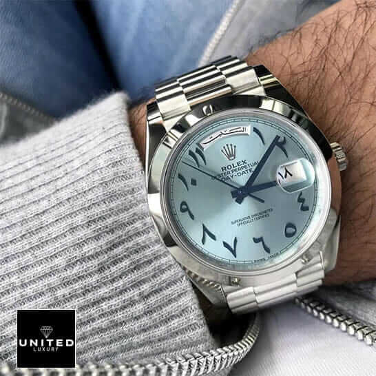 Rolex DayDate 40 228206  under gray sweater