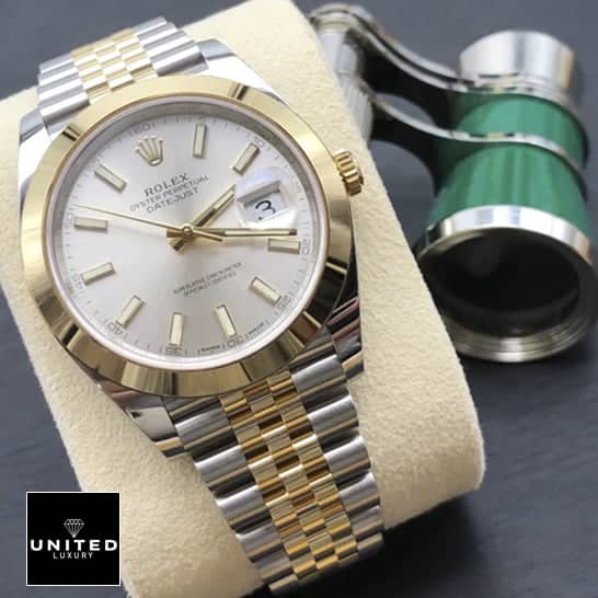 Rolex Datejust 41 126303-0002  watch on cushion on the table