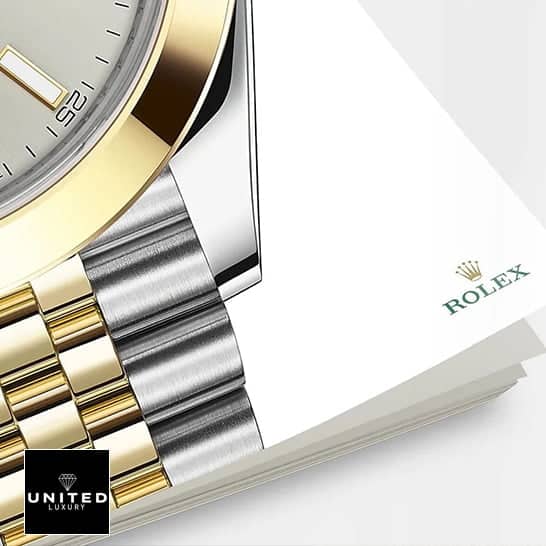 Rolex Datejust 41 126303-0002  Silver Dial Gold Bezel Two tone Bracelet and on the Rolex notebook