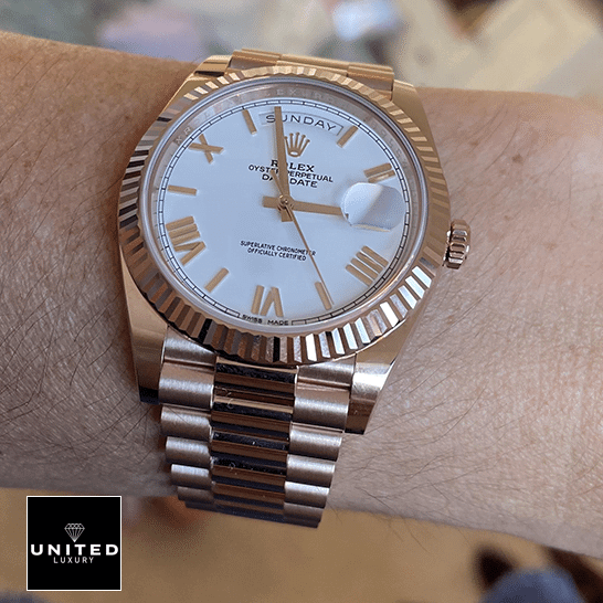 Rolex Day-Date President 118235f-0024 Rose Gold Fluted Bezel  on his arm