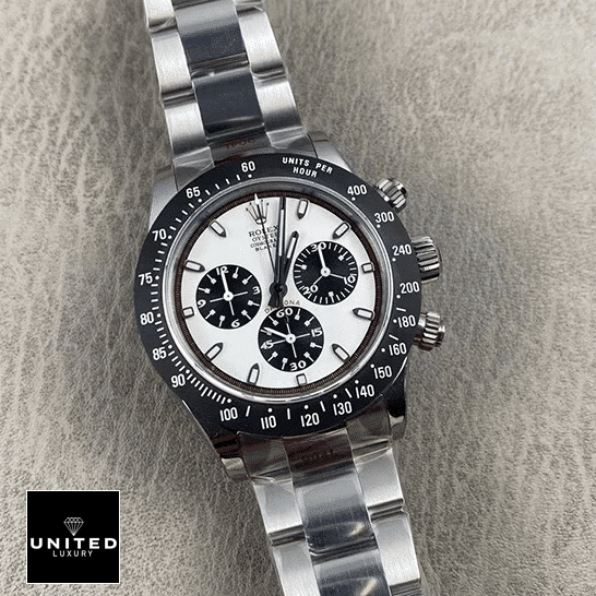 Rolexa Daytona Oyster  White Dial watch on the sand
