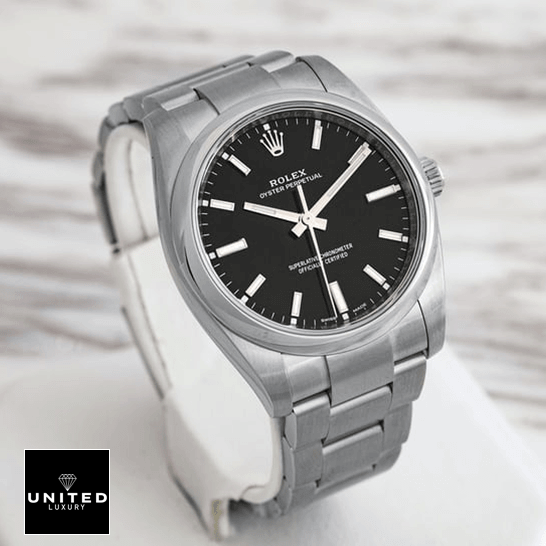 Rolex Oyster Perpetual Black Dial  ceramic background