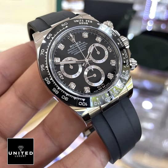 Rolex Daytona Oysterflex 116519LN Black Rubber Bracelet  in their hands