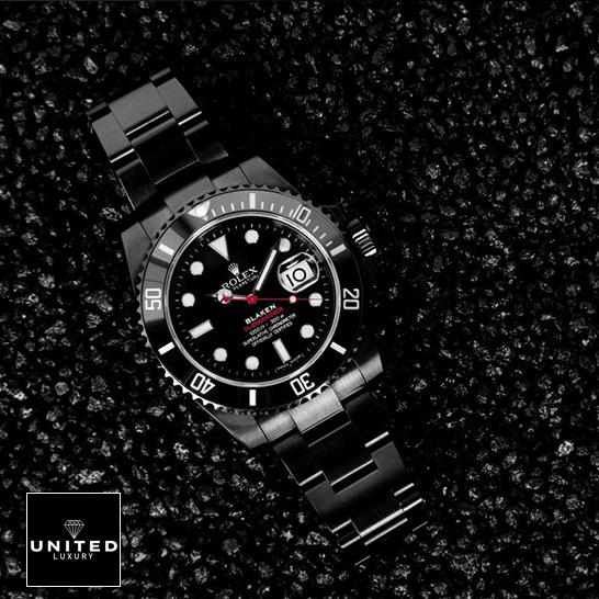 Rolex Blaken Submariner Black Dial  on the asphalt