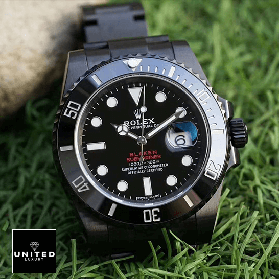Rolex Blaken Submariner Black Dial  on the grass