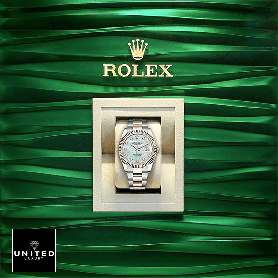 Rolex Datejust 41 126331-0013 Mother Of Pearl  in the Box and Green wave background