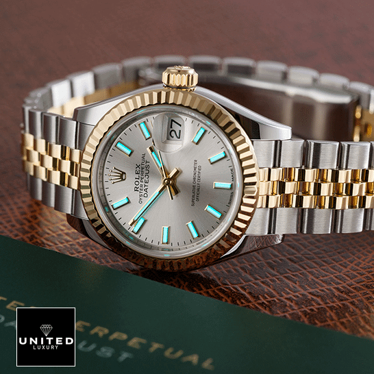 Rolex Datejust 126333 Jubilee Yellow Gold  next to warranty card