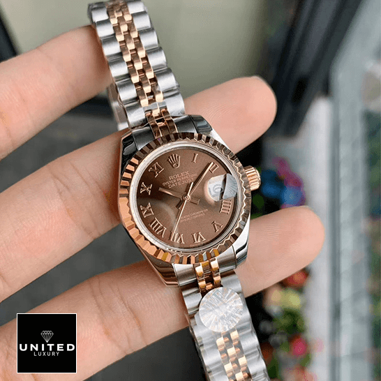 Rolex Datejust 288271 Everose Gold Roman Dial  on the fingers