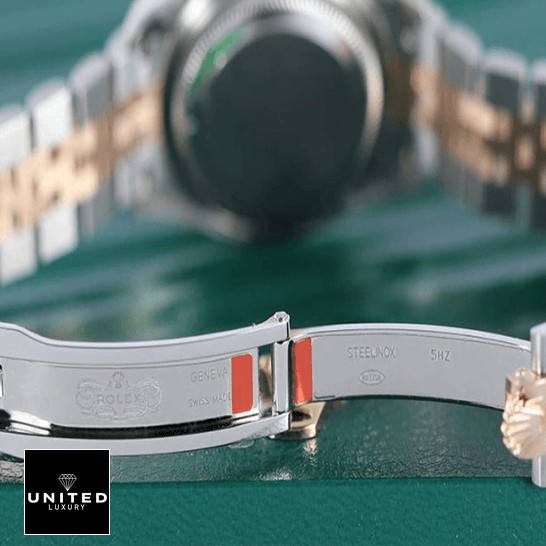 Rolex 279161 Everose Gold Jubilee  opened clasp on the green table