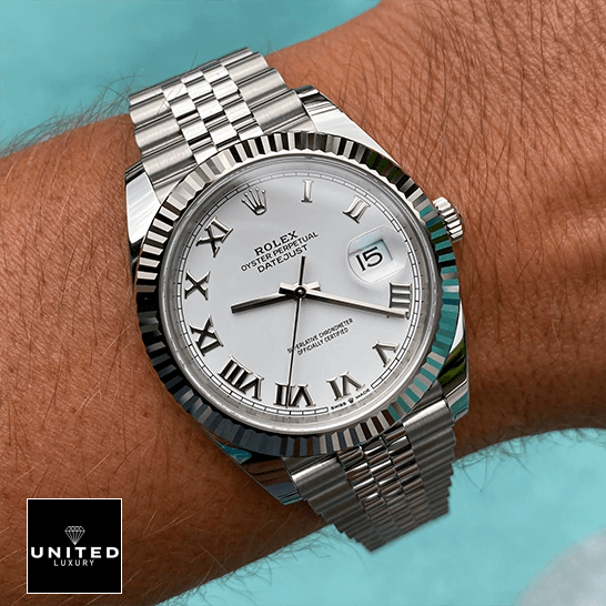 Rolex 126334 Datejust Fluted White Roman Dial  on the man wrist