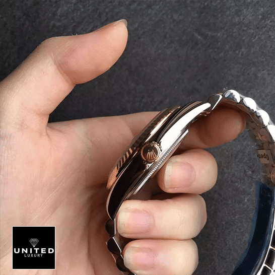 Rolex Gold 228238-0003  side view on hand and push button