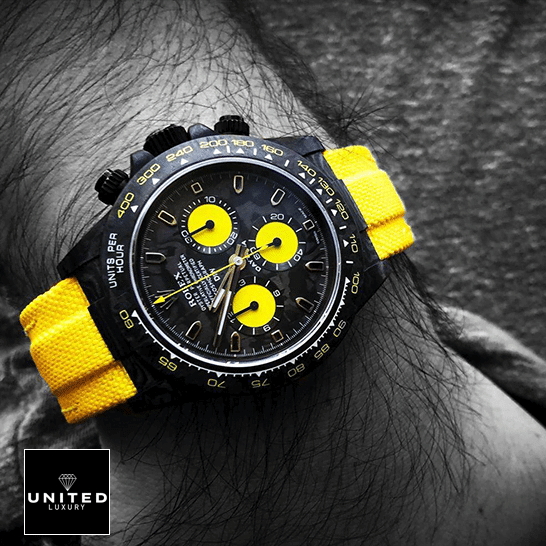 Rolex Daytona DiW NTPT “All Carbon Lemon Edition”  on his arm