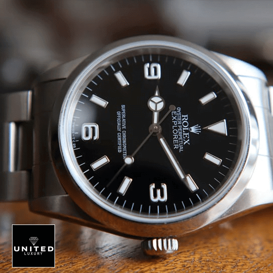 Rolex Explorer 124270 Stainless Steel Case and Bezel  on a wooden table