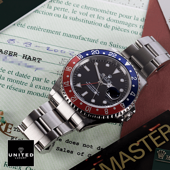 Rolex GMT-Master 116719BLRO-0001 Pepsi Red/Blue 1 Rolex GMT-Master Pepsi 116719BLRO-0001 on the table