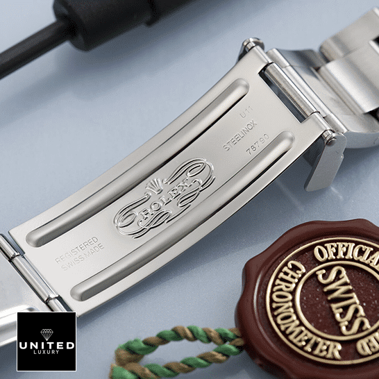 Rolex GMT-Master II Coke 16710  Open Fold Clasp on the table