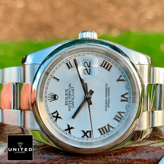 Rolex Oyster Perpetual Datejust White Dial 116200  on the Table