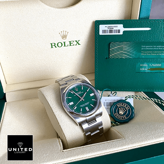 Rolex Oyster Perpetual 126000 Green Dial  & Guarantee Card in the Rolex Box