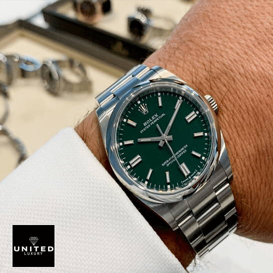 Rolex Oyster Perpetual Green Dial 126000  on his arm