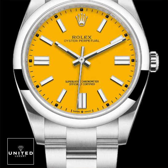 Rolex Perpetual 124300 Yellow Dial Stick indices  and Black Background