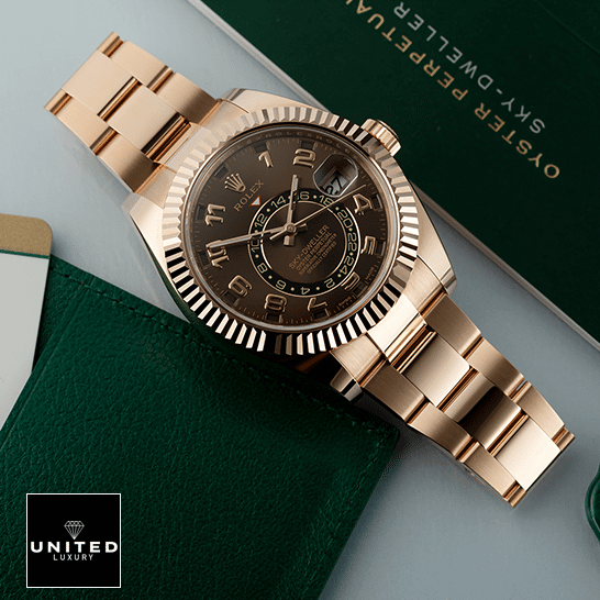 Rose Gold Sky-Dweller 1 Rolex Sky-Dweller Chocolate Dial Rose Gold 326935-0003 Oyster on the table