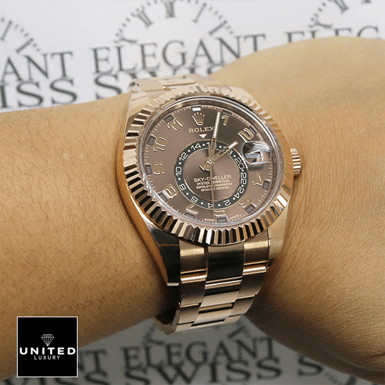 Rose Gold Sky-Dweller 6 Rolex Sky-Dweller Chocolate Dial Rose Gold 326935-0003 Oyster on his arm